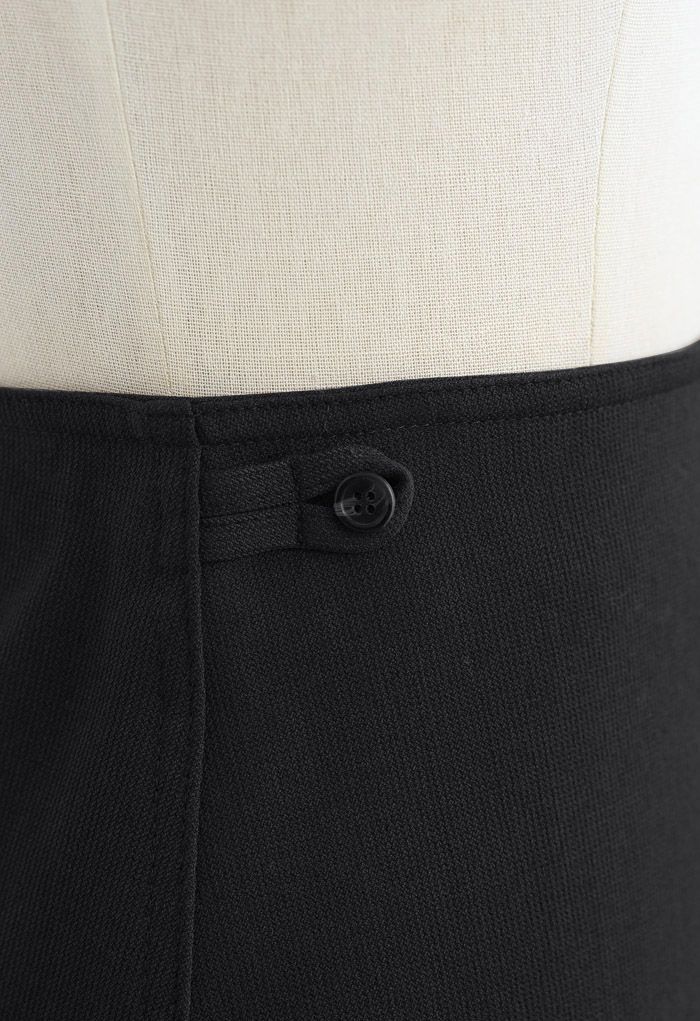 Mini-jupe Bud à double bouton en noir