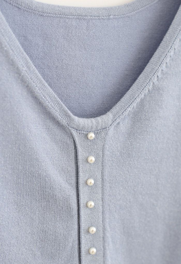 Haut en tricot scintillant à bordure perlée en bleu