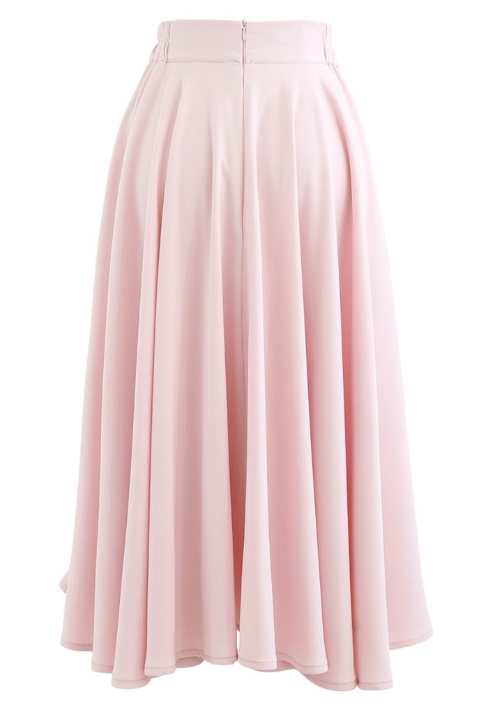 Jupe mi-longue évasée à taille élastique de couleur unie en rose