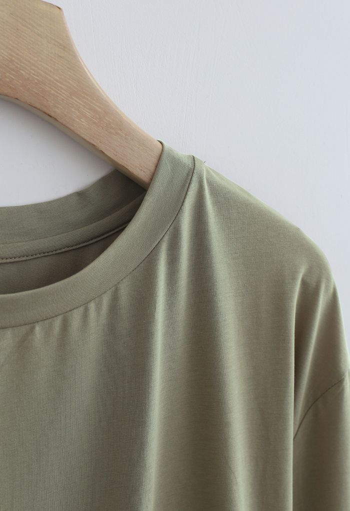 Sweat-shirt ample à une poche en olive
