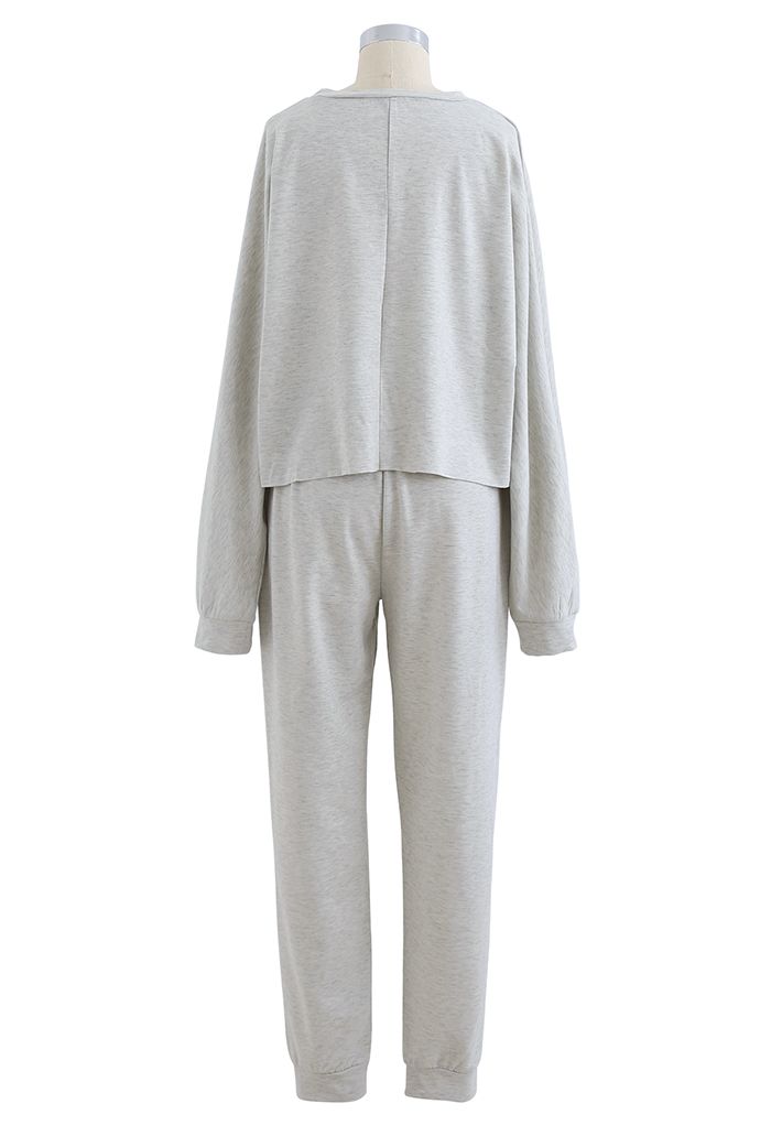 Ensemble sweat-shirt à ourlet brut et pantalon à coutures gris