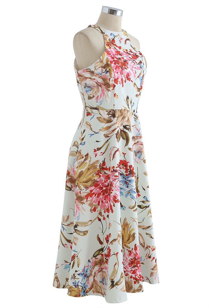 Superbe robe mi-longue à imprimé floral et licou en rose