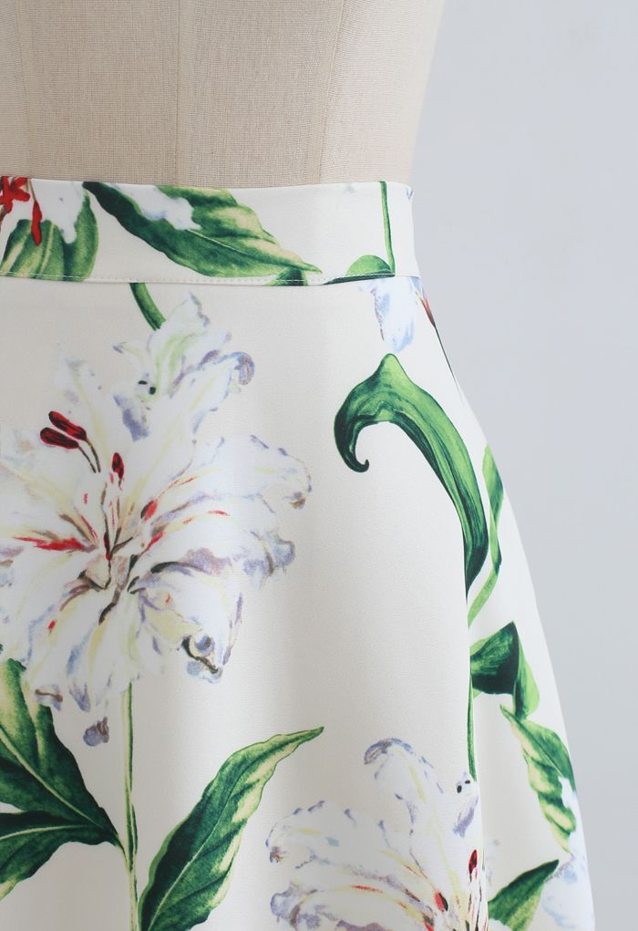 Superbe jupe mi-longue trapèze à imprimé floral en vert