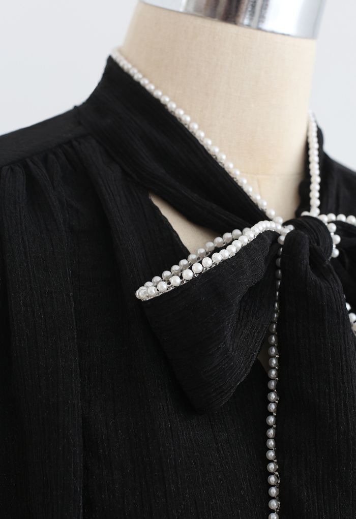 Chemise semi-transparente à bordure perle Bowknot en noir
