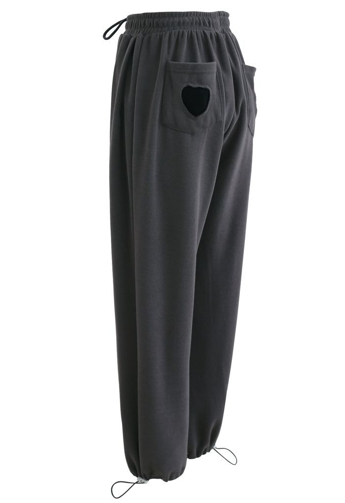 Pantalon de jogging avec cordon de serrage et poche plaquée cœur en fumée