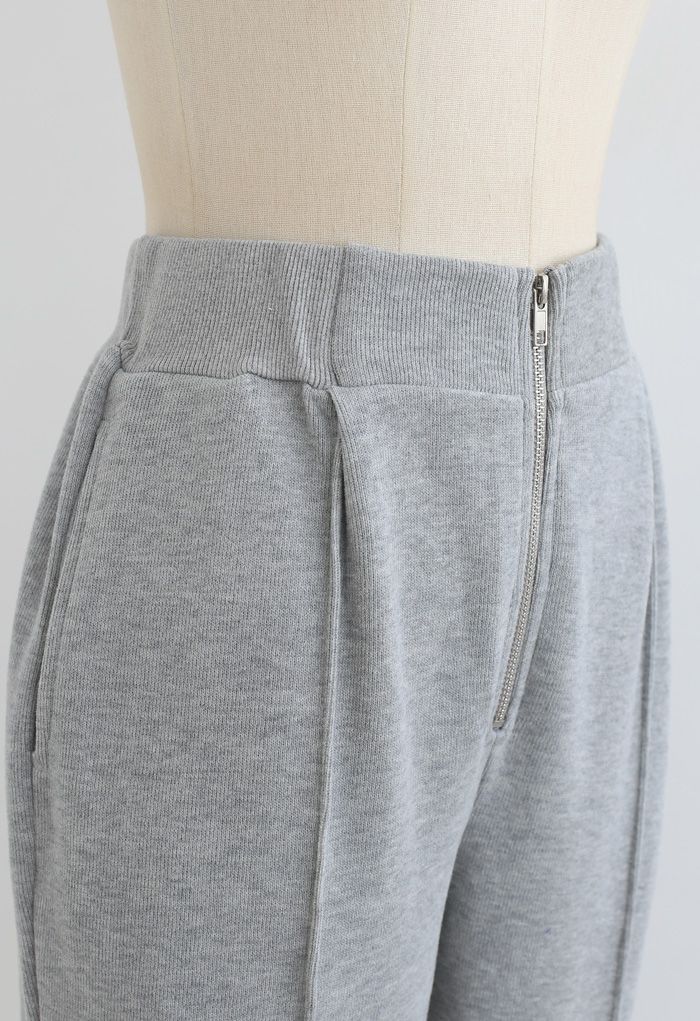 Pantalon de jogging zippé avec poche latérale sur le devant en gris