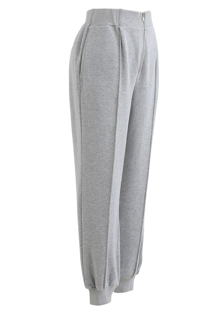Pantalon de jogging zippé avec poche latérale sur le devant en gris