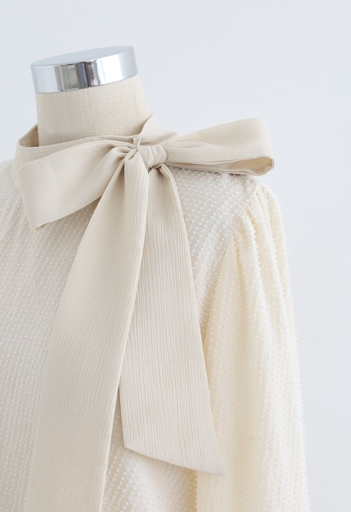 Tie a Bow Shimmer Tassel Top in Cream