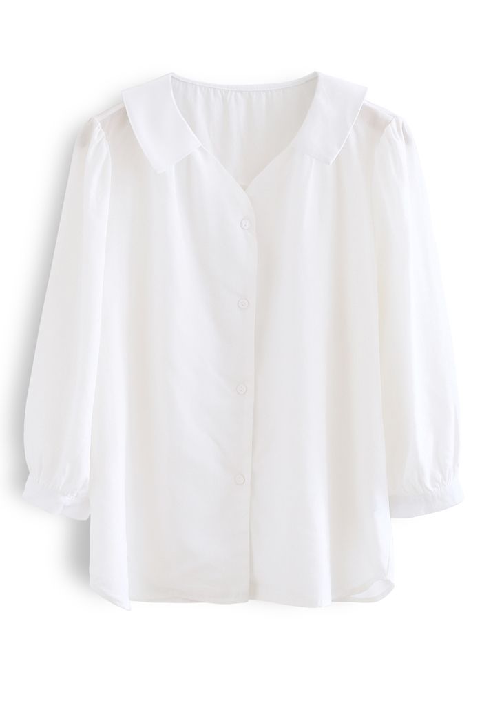 Chemise boutonnée à manches trois-quarts en blanc
