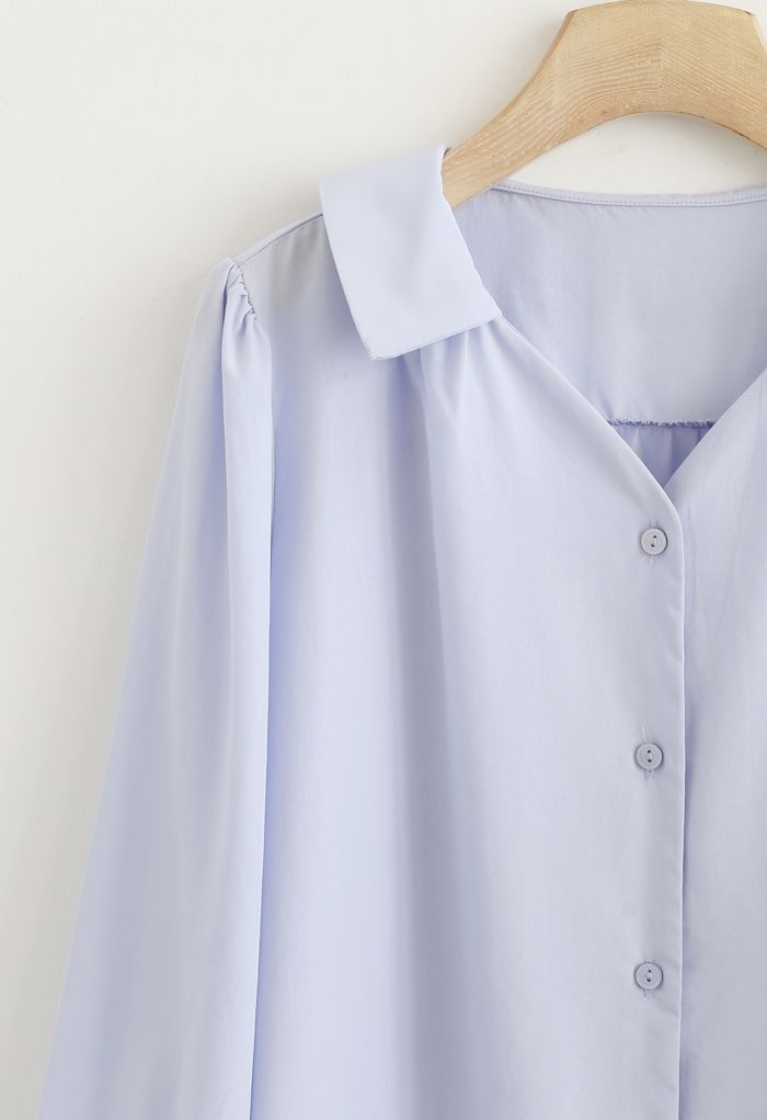 Chemise boutonnée à manches trois-quarts en bleu
