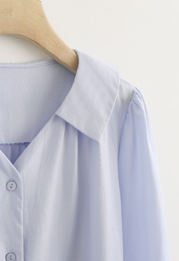 Chemise boutonnée à manches trois-quarts en bleu