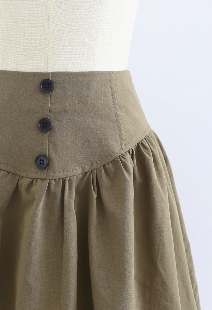 Mini-jupe taille haute à boutons en kaki