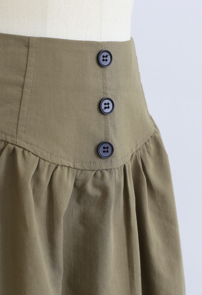 Mini-jupe taille haute à boutons en kaki