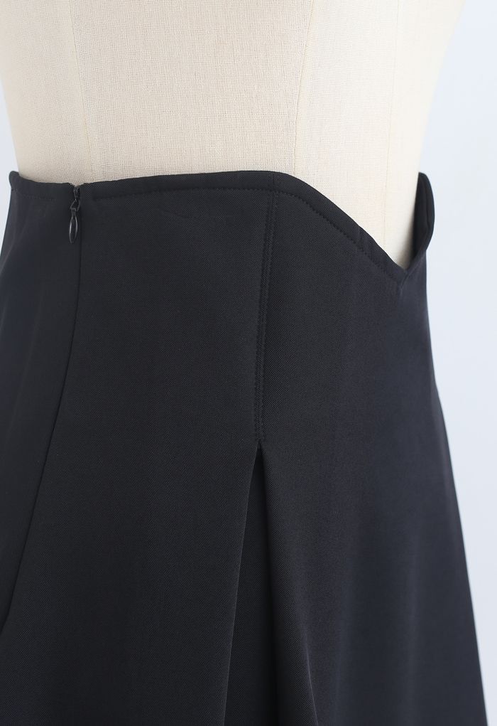 Mini-jupe plissée corset taille haute en noir