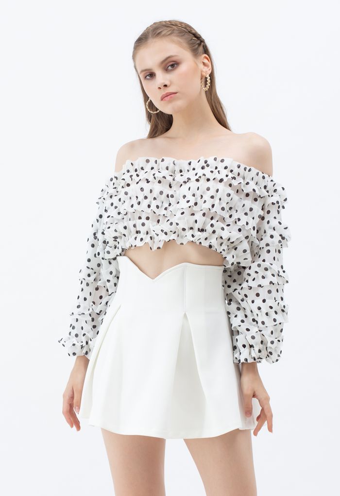 Mini-jupe plissée corset taille haute en blanc