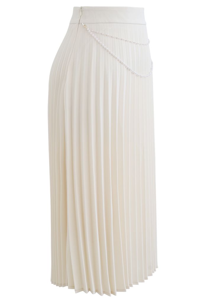 Jupe mi-longue plissée à chaîne drapée en crème