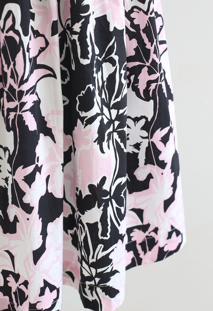 Jupe mi-longue plissée à imprimé floral d'été en noir