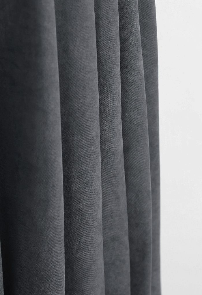 Jupe mi-longue asymétrique ceinturée à plis latéraux en gris
