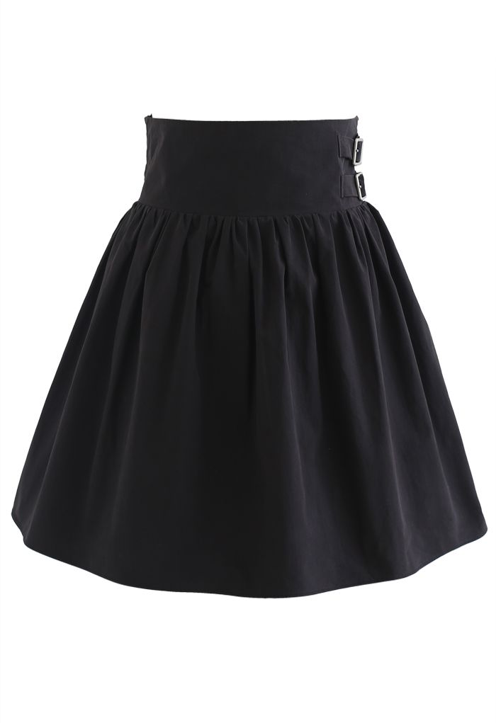 Mini-jupe plissée à double ceinture en noir