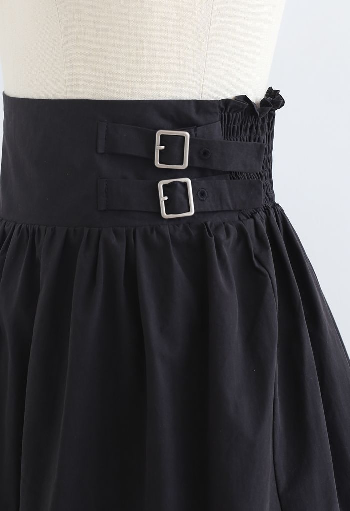 Mini-jupe plissée à double ceinture en noir