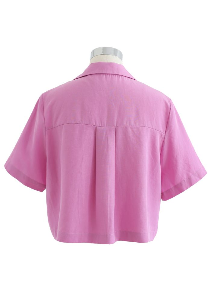 Chemise courte boutonnée avec poche à revers cranté en rose