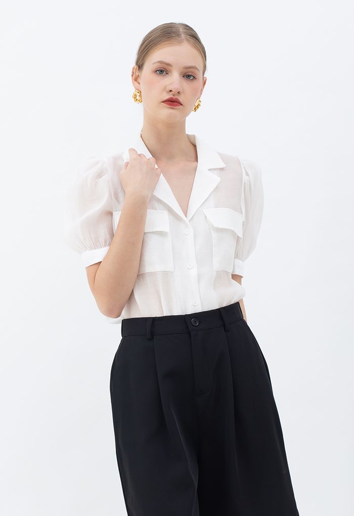 Chemise boutonnée à col cranté et poche à rabat en blanc
