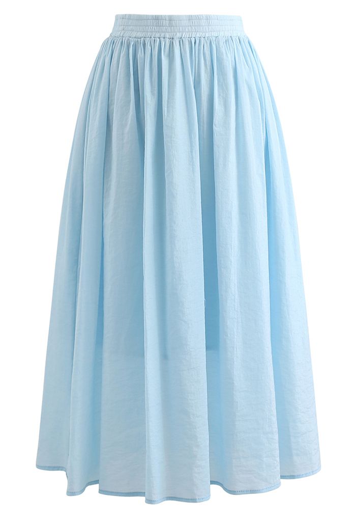 Ensemble camisole courte et jupe mi-longue aux couleurs pastel en bleu