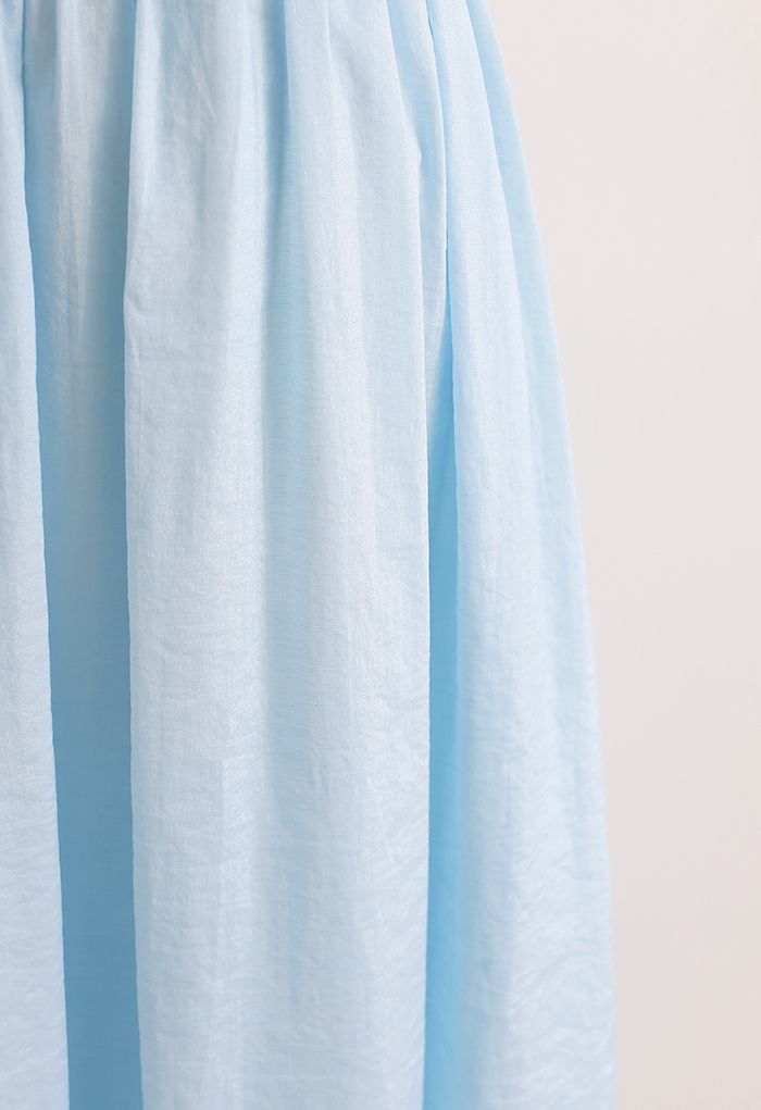 Ensemble camisole courte et jupe mi-longue aux couleurs pastel en bleu