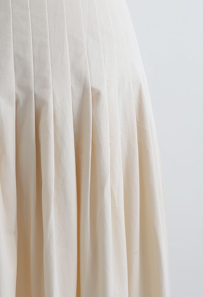 Jupe mi-longue en coton à taille plissée en crème