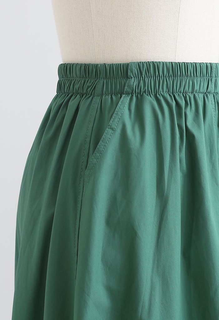 Jupe en coton à poche latérale de couleur unie en vert foncé