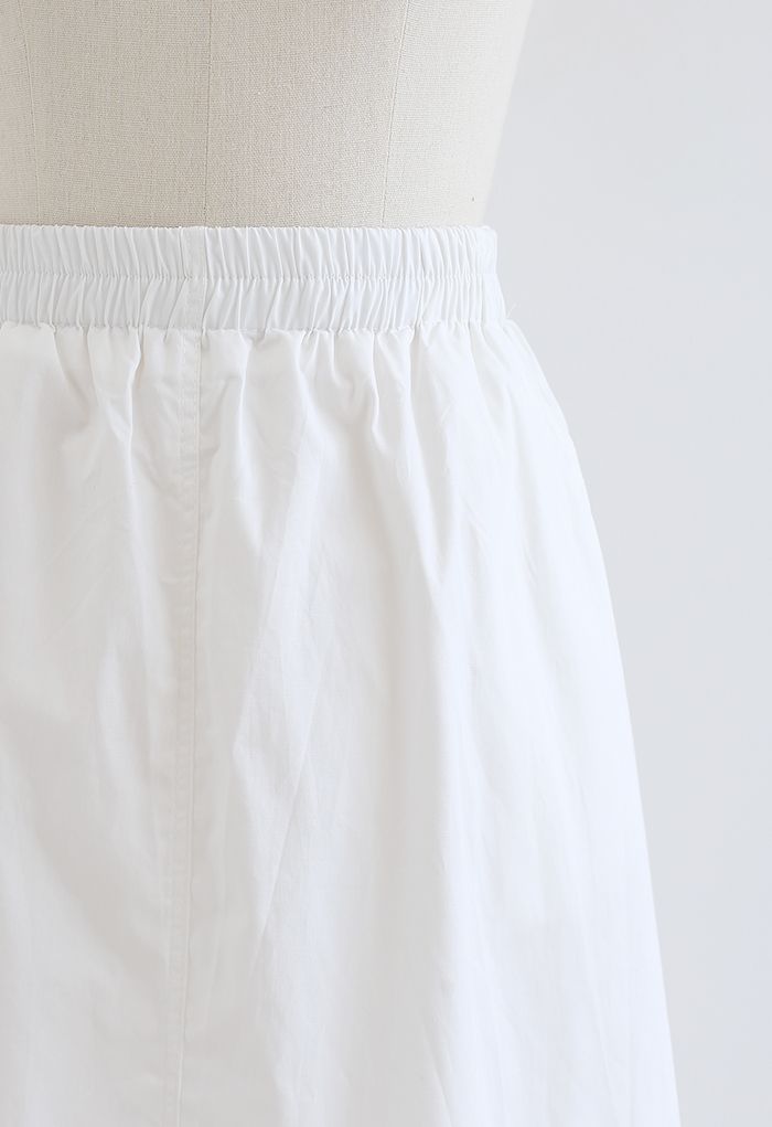 Jupe en coton à poche latérale de couleur unie en blanc