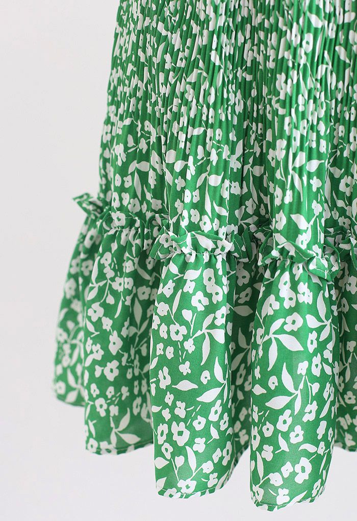 Mini-jupe à volants et imprimé fleuret en vert