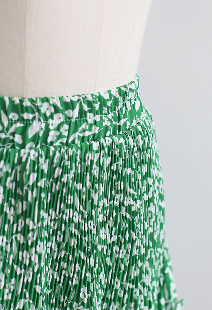 Mini-jupe à volants et imprimé fleuret en vert
