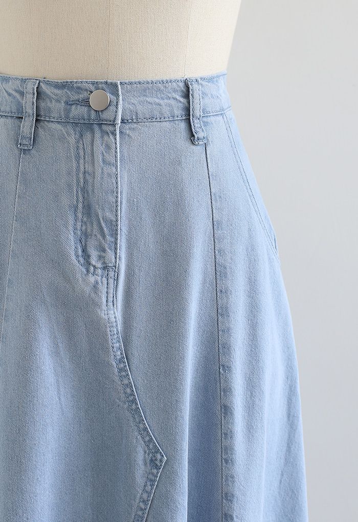 Jupe mi-longue en jean coupe trapèze avec poche latérale en bleu clair