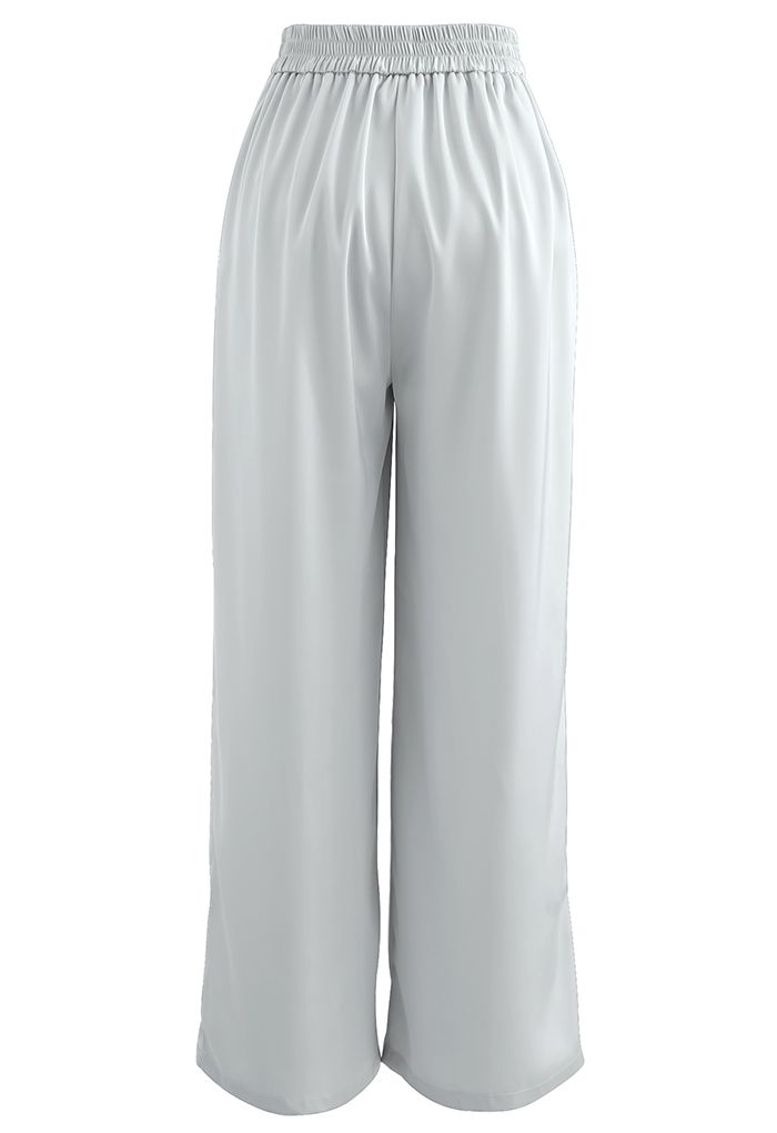 Pantalon large plissé brillant en gris clair