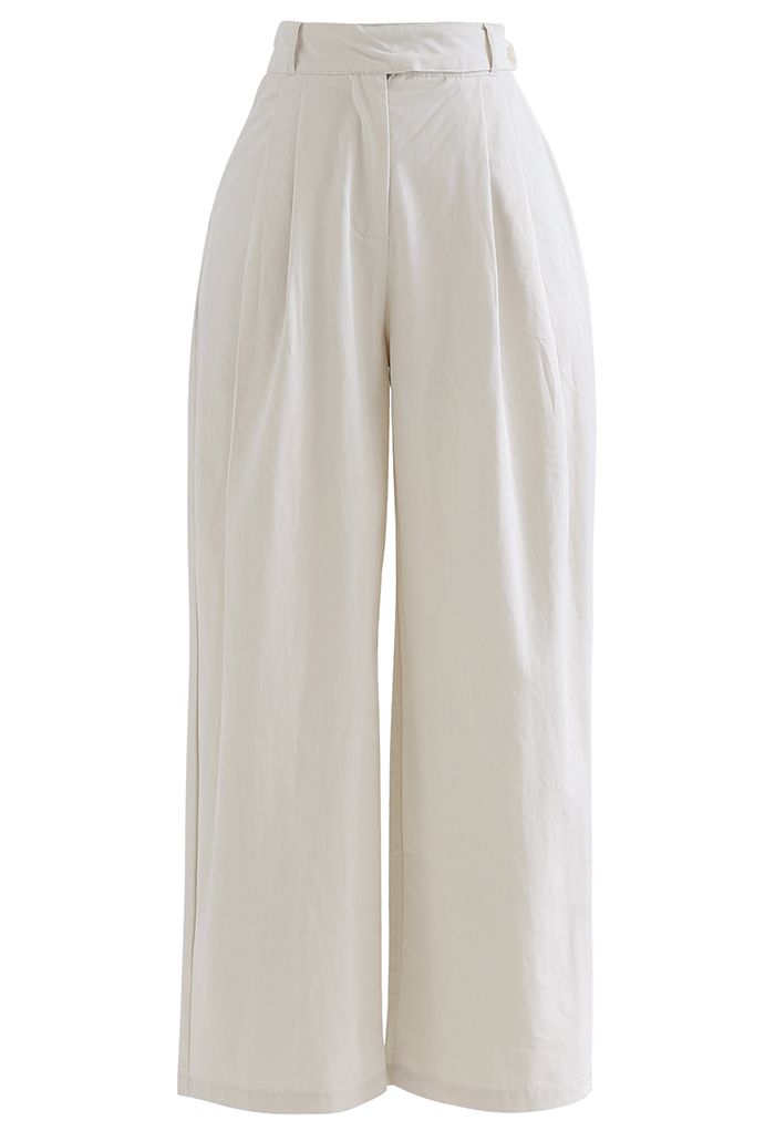 Pantalon droit en coton à taille ceinturée en ivoire