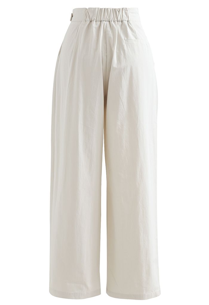 Pantalon droit en coton à taille ceinturée en ivoire