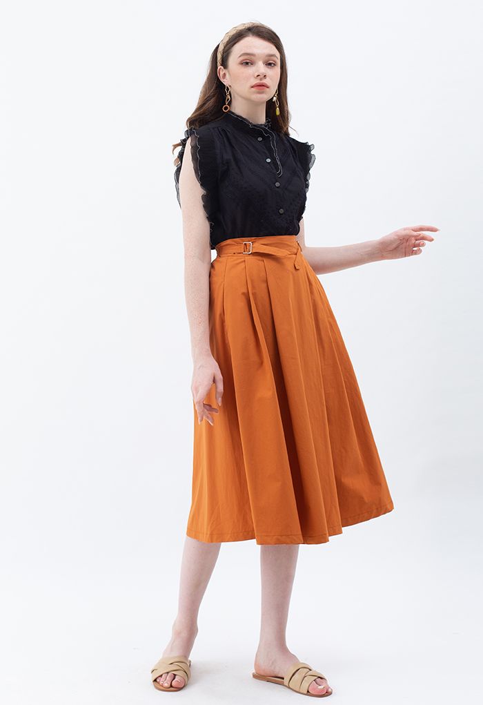 Jupe mi-longue plissée en coton à taille ceinturée en orange