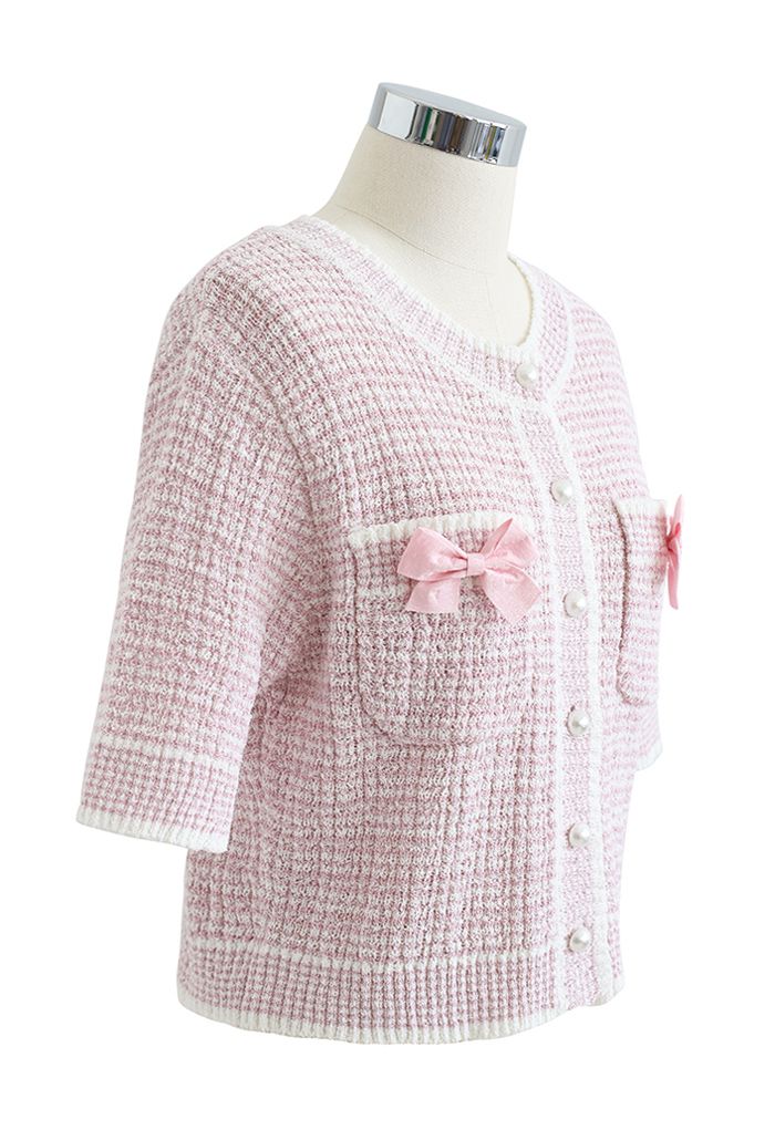 Cardigan en tricot boutonné décoré de nœuds en rose clair