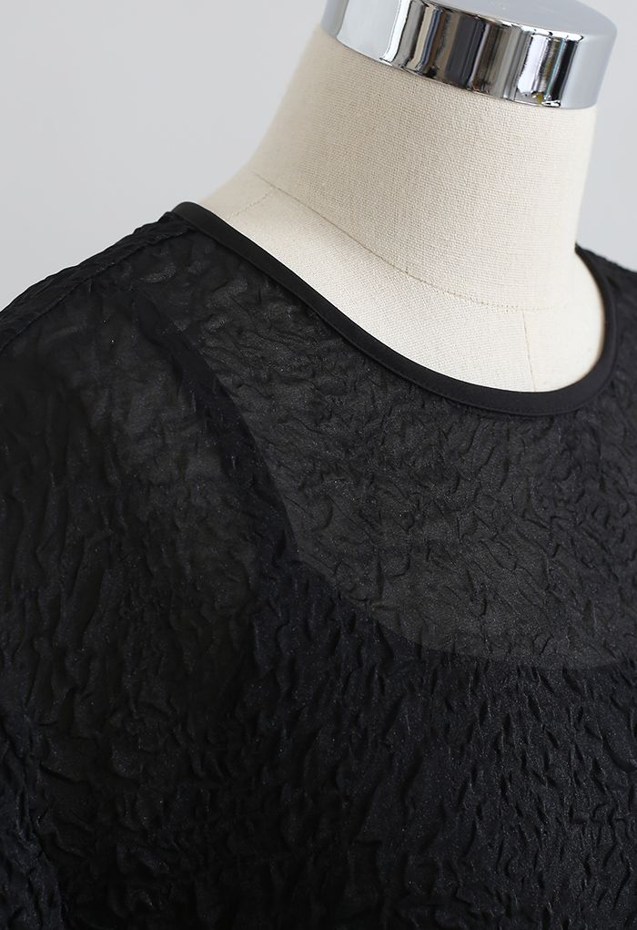 Robe Dolly transparente scintillante en relief à volants en noir