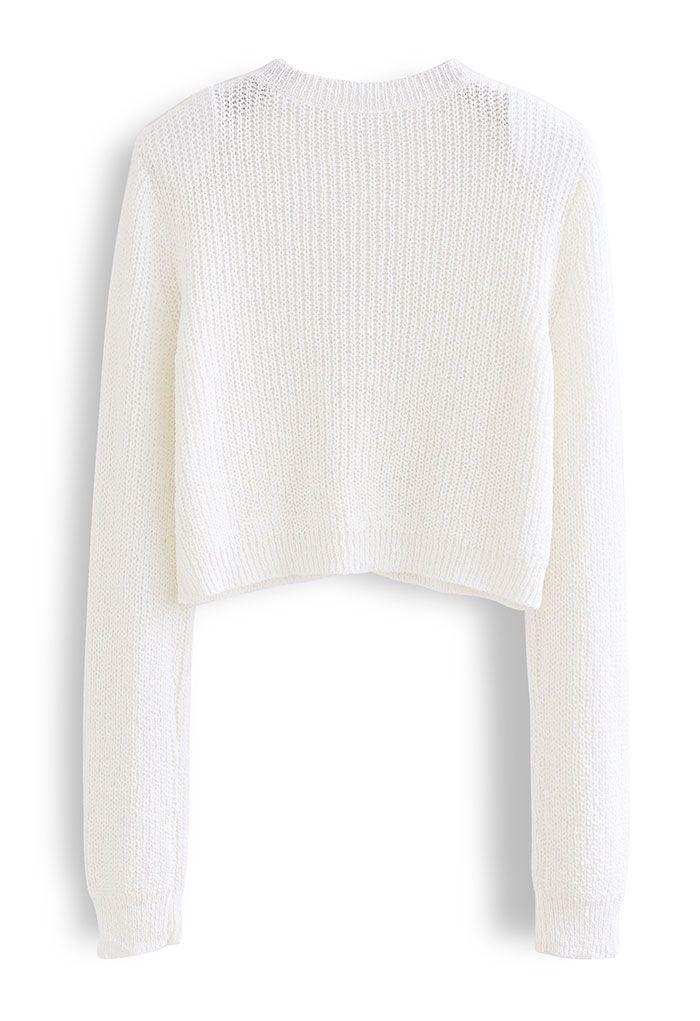 Cardigan court boutonné en tricot à épaules rembourrées en blanc