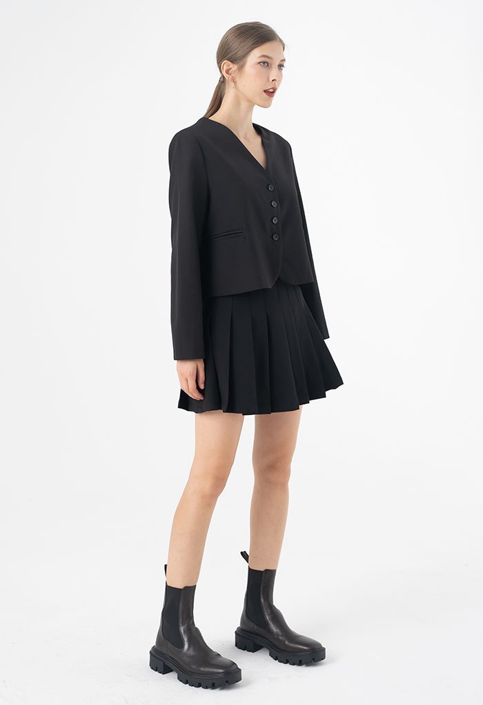 Mini-jupe plissée taille haute en noir
