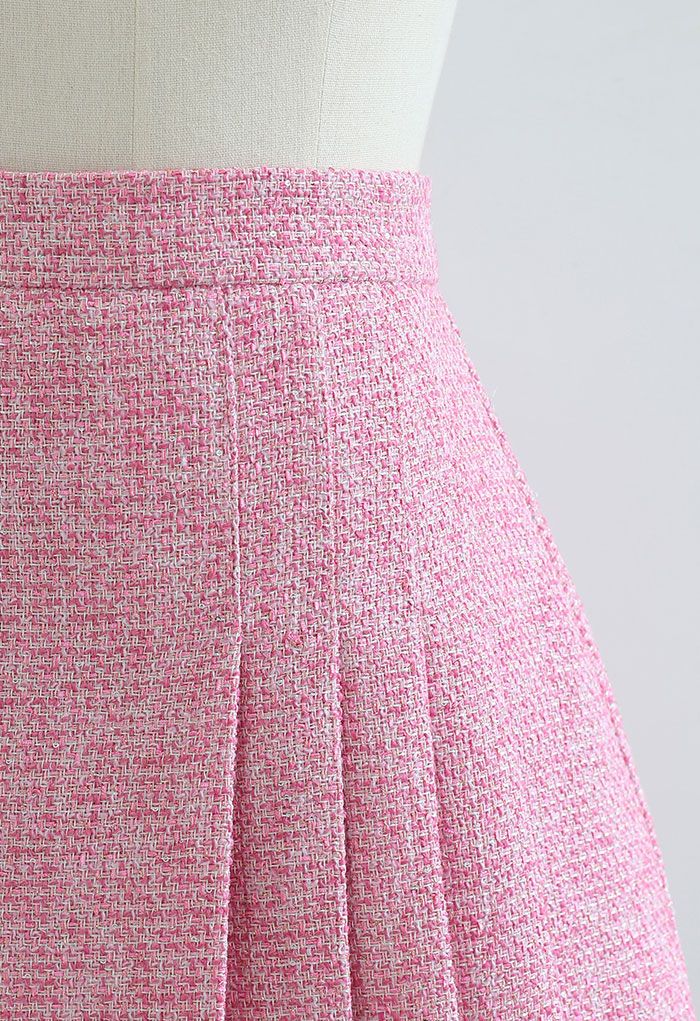 Mini-jupe en tweed plissé métallisé scintillant en rose vif