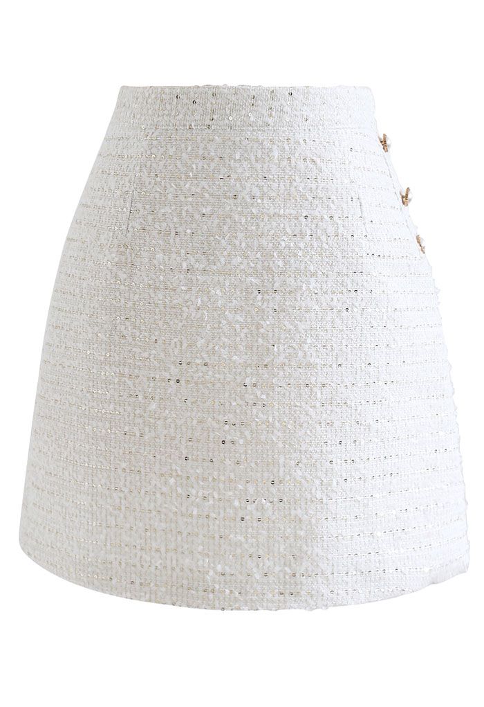 Mini-jupe en tweed à sequins et bordure boutonnée en blanc