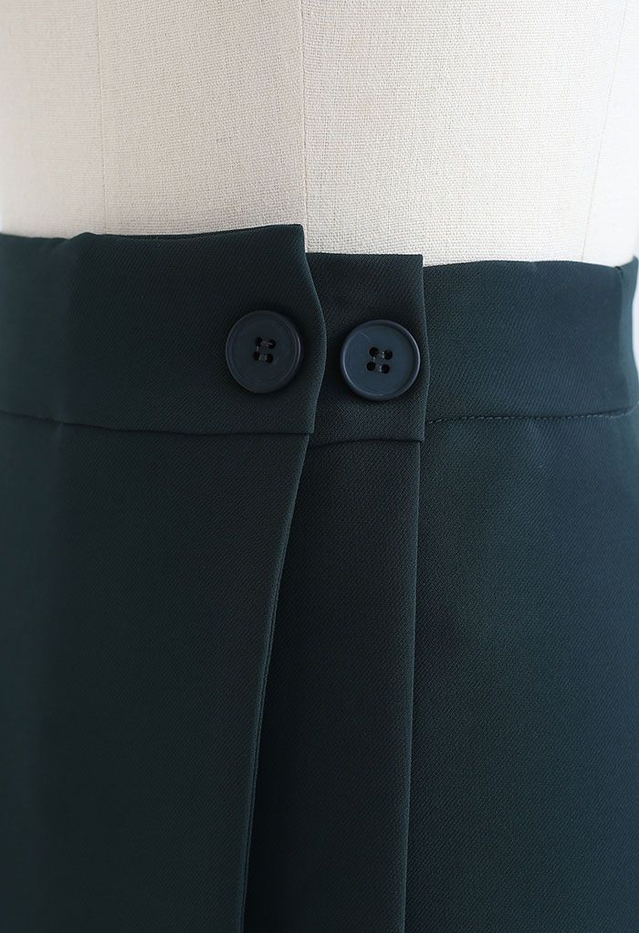Mini-jupe boutonnée à double rabat en émeraude