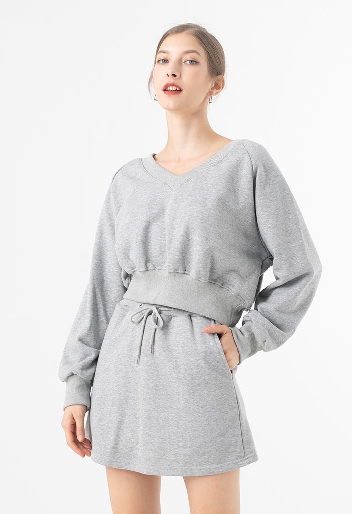 Mini jupe-short en coton avec poche à cordon de serrage en gris