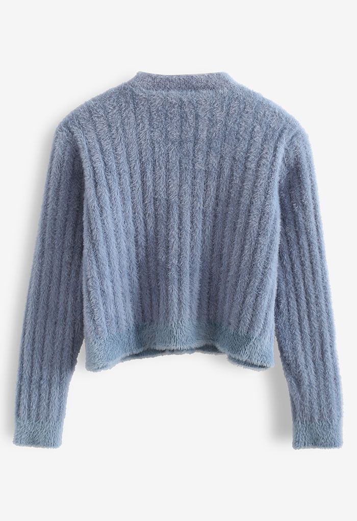 Cardigan court boutonné en tricot flou en bleu