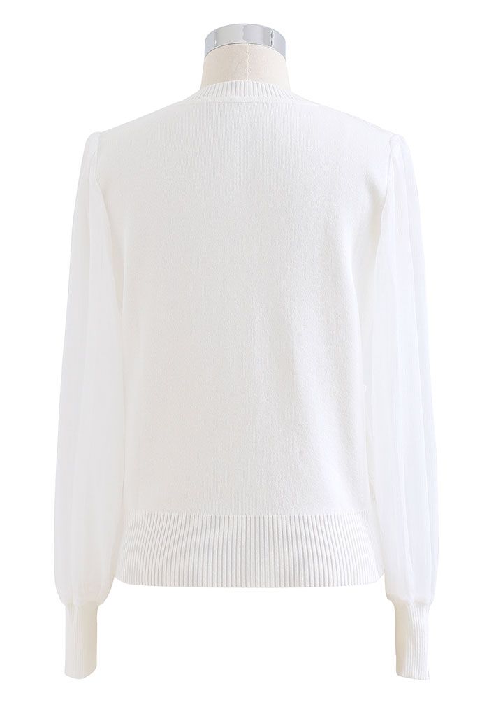 Haut en tricot à manches transparentes avec bordure en dentelle et boutons en blanc