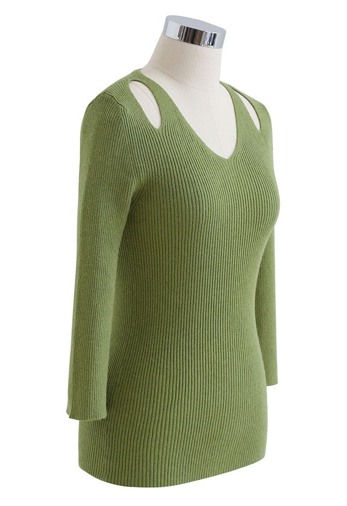 Haut en tricot ajusté aux épaules découpées en vert