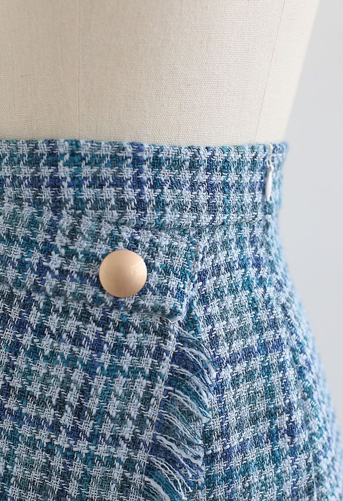 Mini jupe à rabat en tweed pied-de-poule à pampilles en bleu